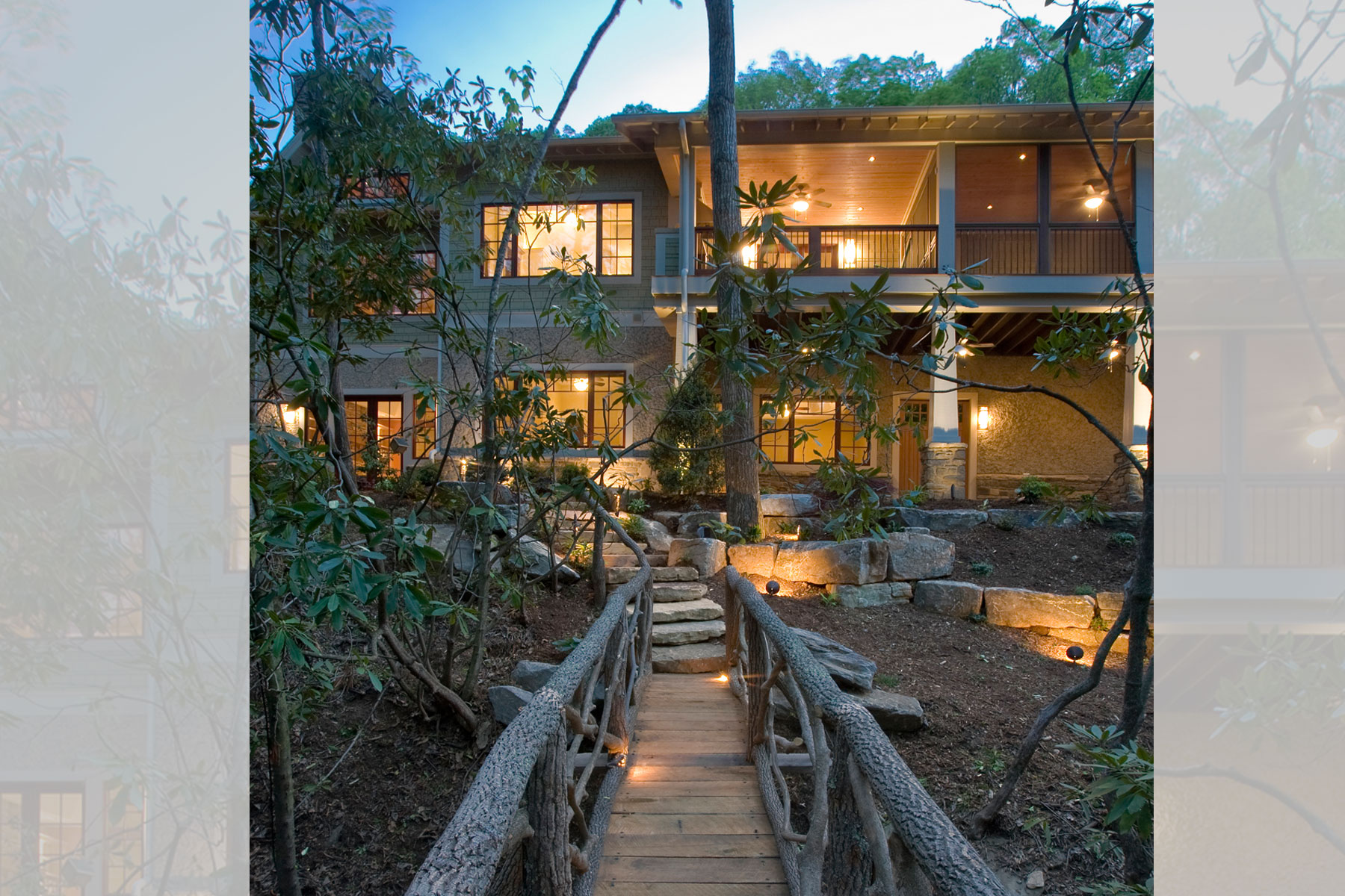 Bridge in backyard of mountain craftsman home