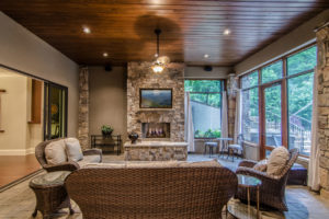 Enclosed under deck patio finished for indoor outdoor entertaining