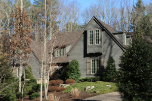 English Manor Style Shingle Home in Asheville painted with Sherwin-Williams Urbane Bronze