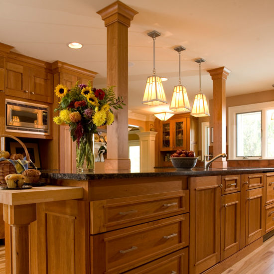 Craftsman style kitchen with rich wood cabinets