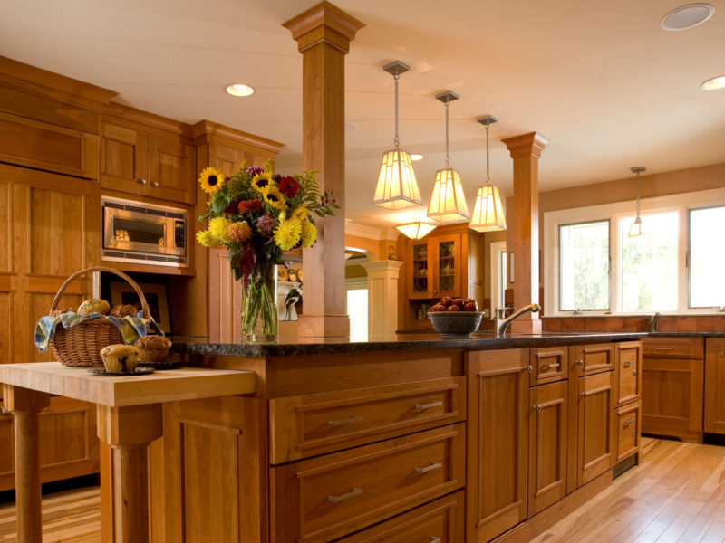 Craftsman style kitchen with rich wood cabinets