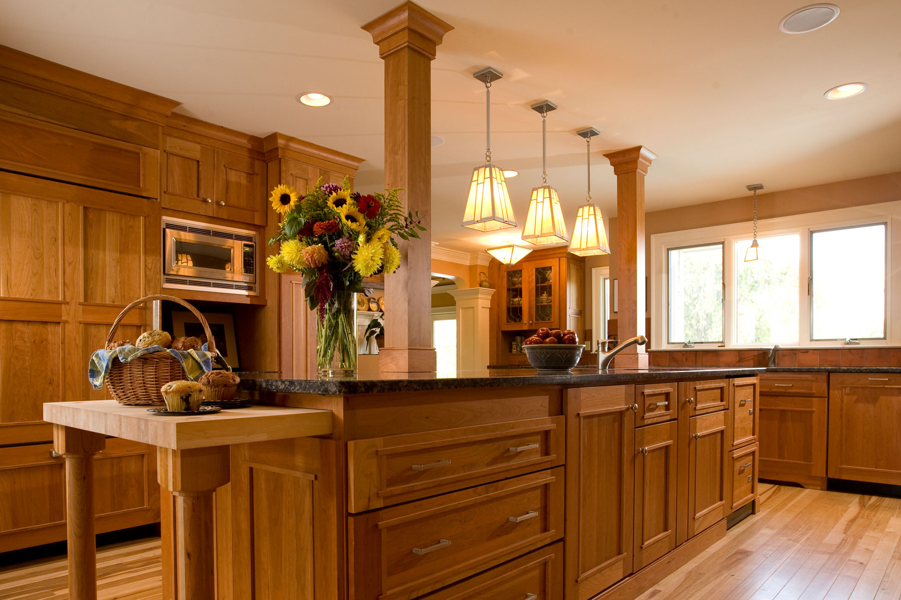 Lighting design makes the room in this kitchen remodel in the Weaverville Farmhouse Renovation