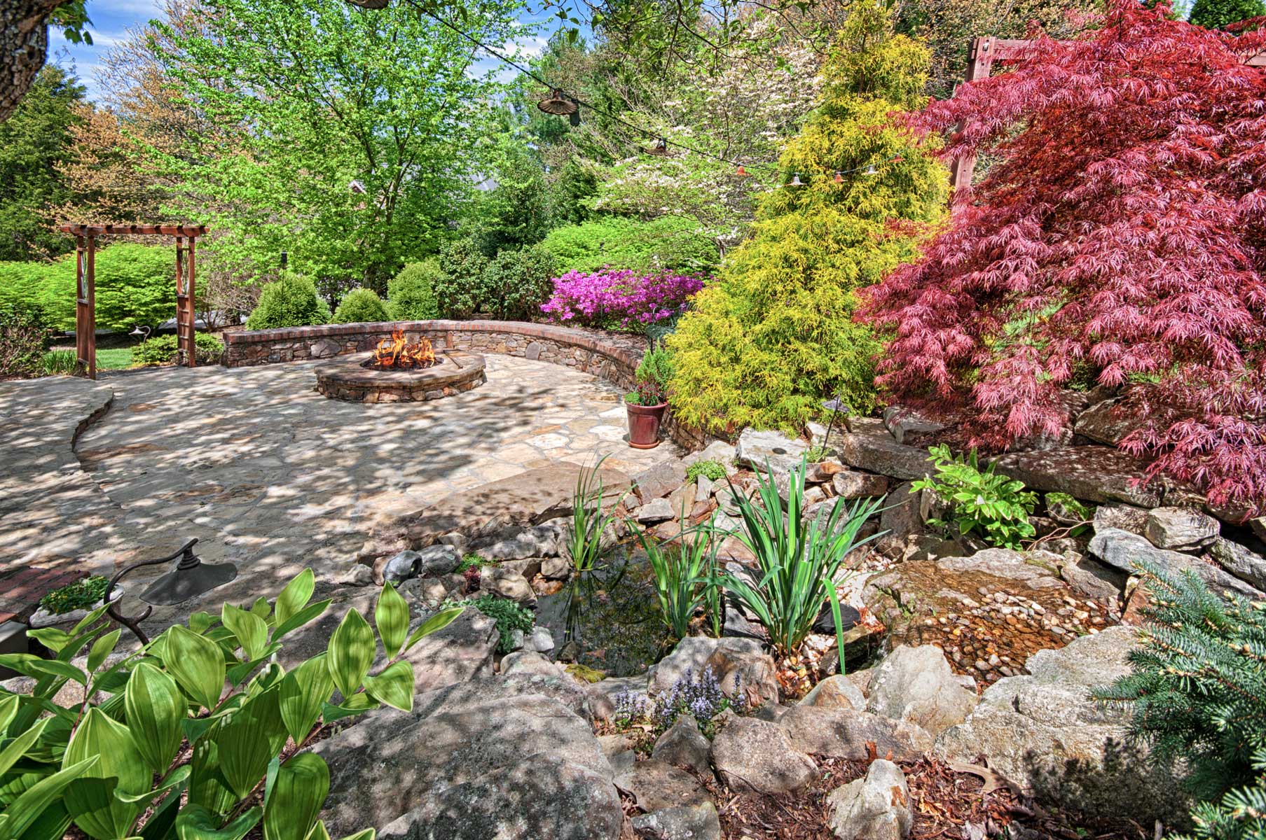 Stone patio with outdoor firepit