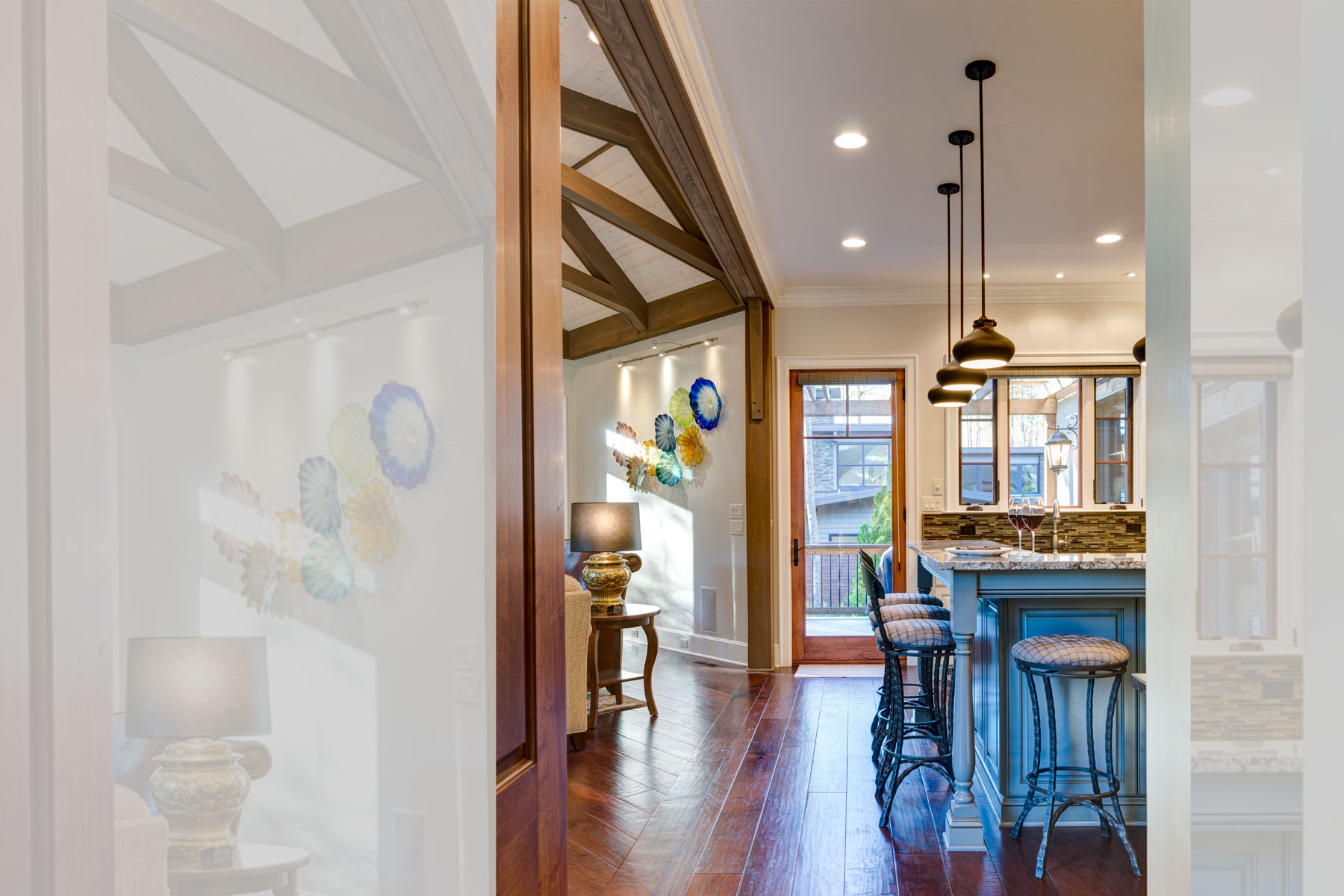 Flooring and ceiling heigh transition from kitchen to family room