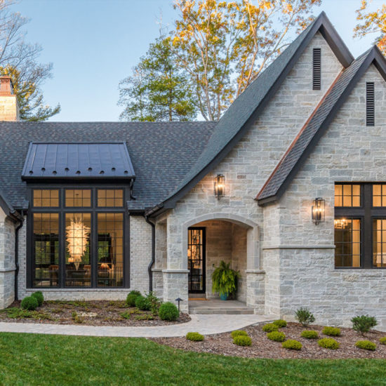 Front elevation of new stone house designed by ACM Design of Asheville, NC