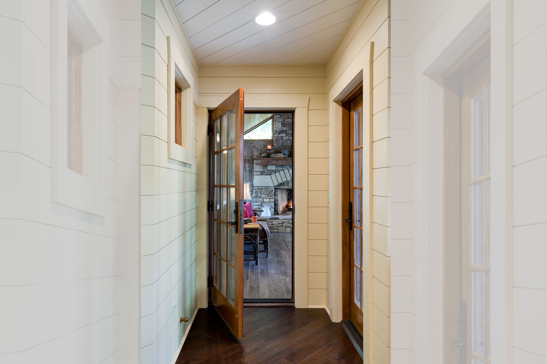 doorway-ktichen-to-screened-room-overlooking-lake