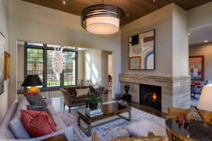 Fireplace separting living room and dining room