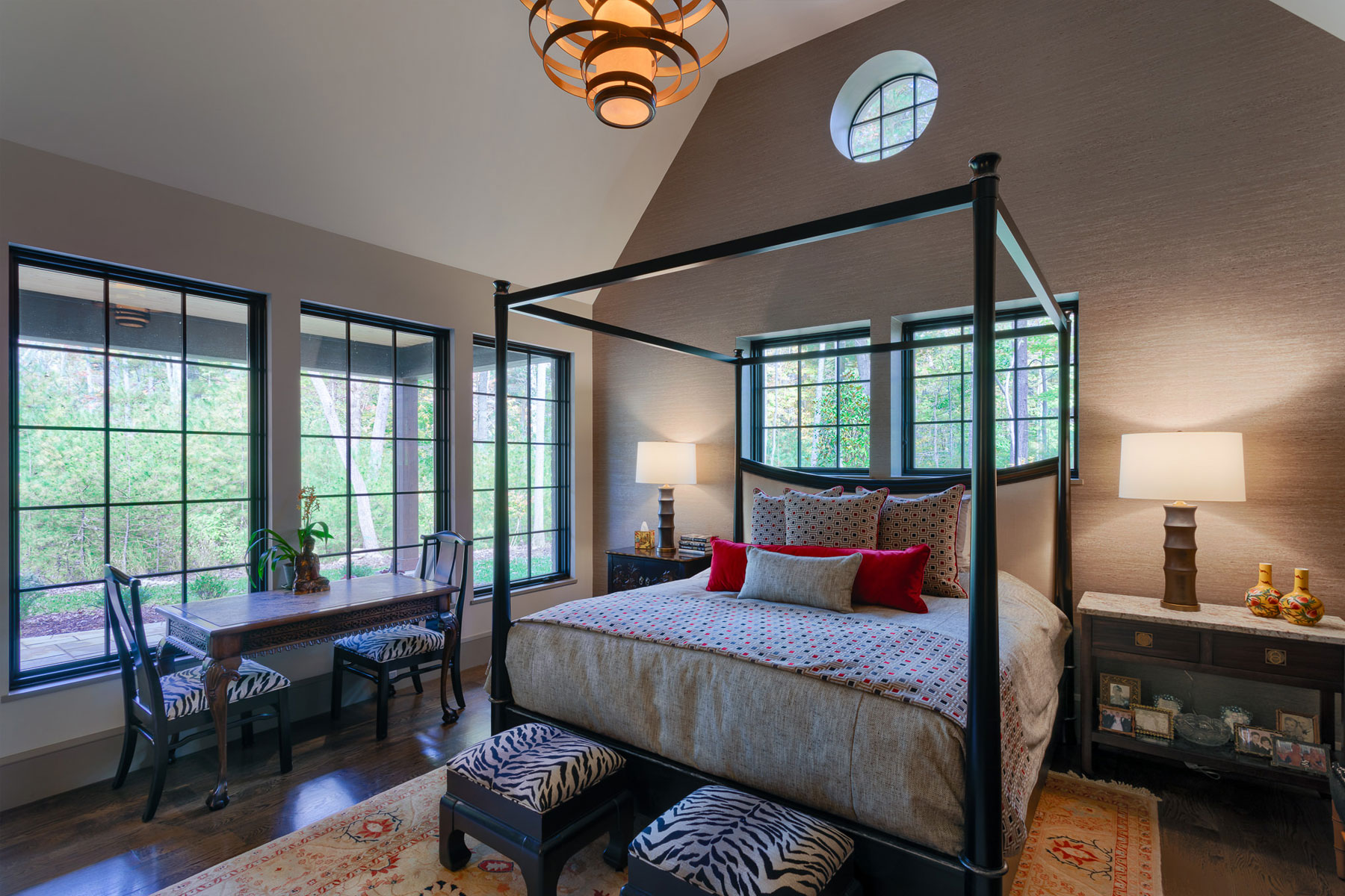 Second master suite with pitched ceiling on lower level of moutain home