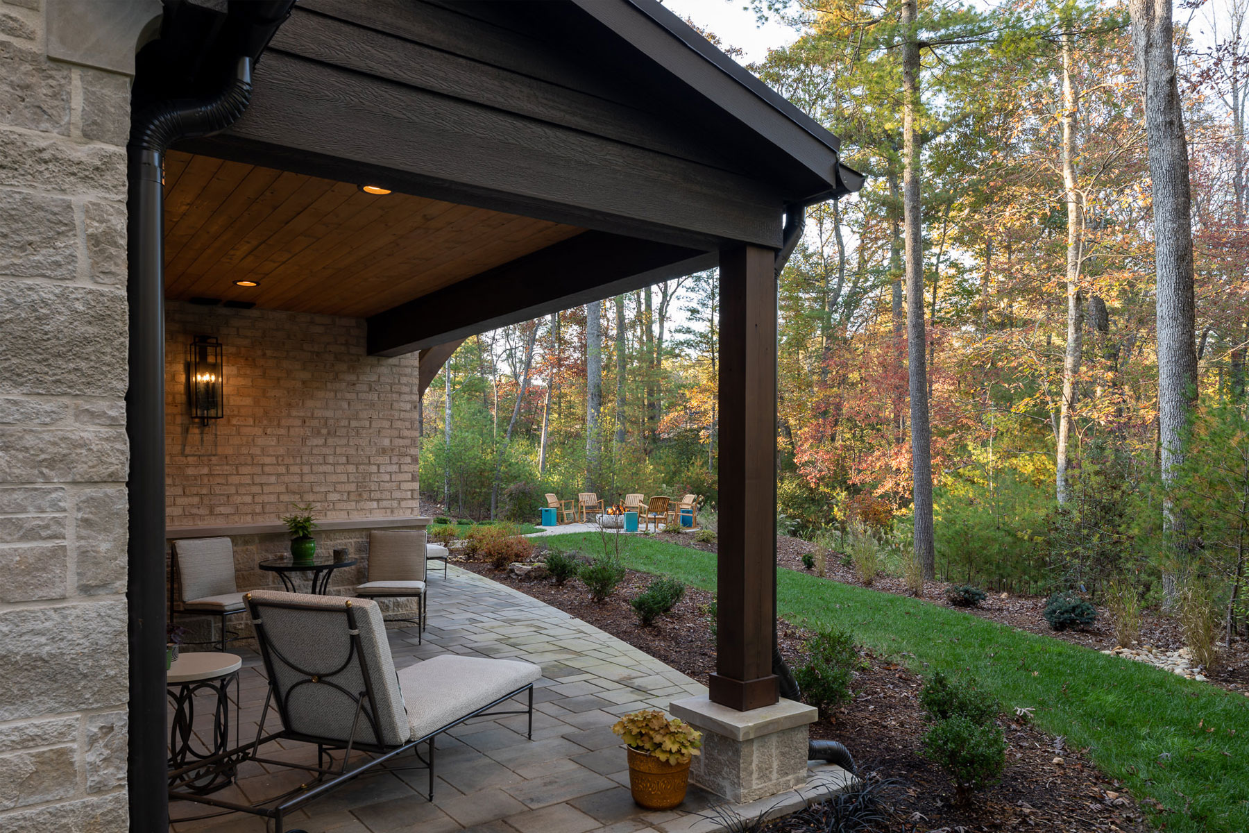 covered porch off of lower level master suite