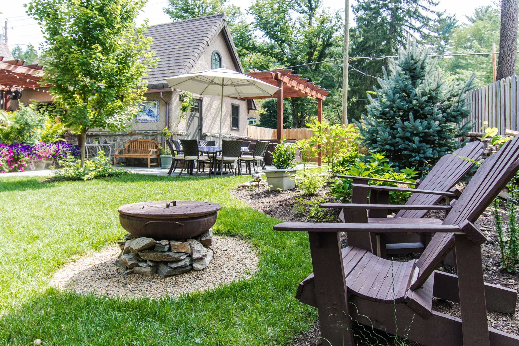 Backyard firepit in Grove Park Renovation