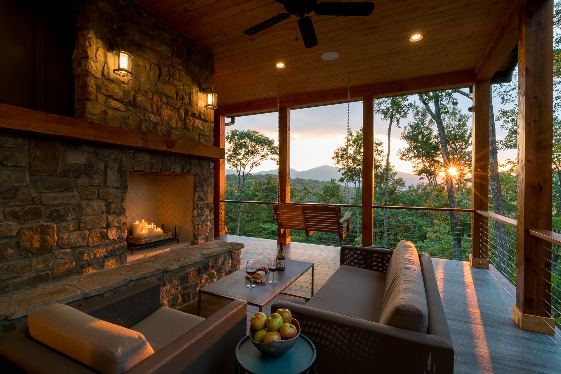 Deck with swing and fireplace with seating area above 4000 feet sea level