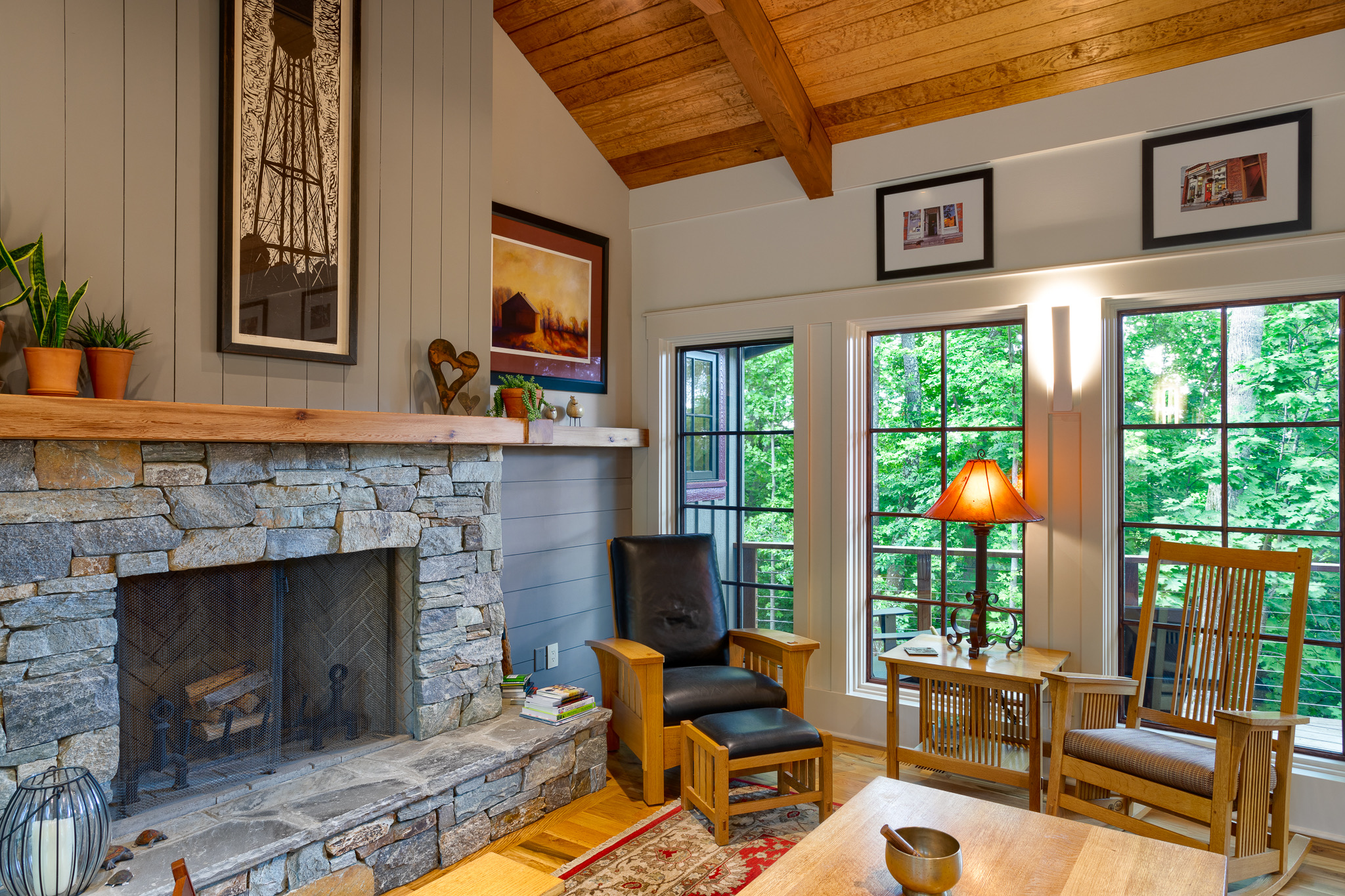 Craftsman style living room with rock fireplace