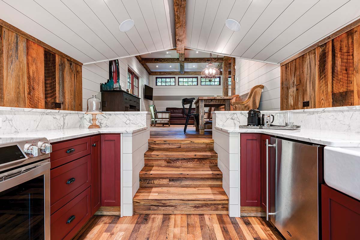 Small kitchen space with highend materials with marble counters