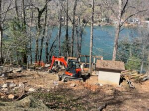 Demolition of existing home on Lake Lure to rebuild new rustic cabin