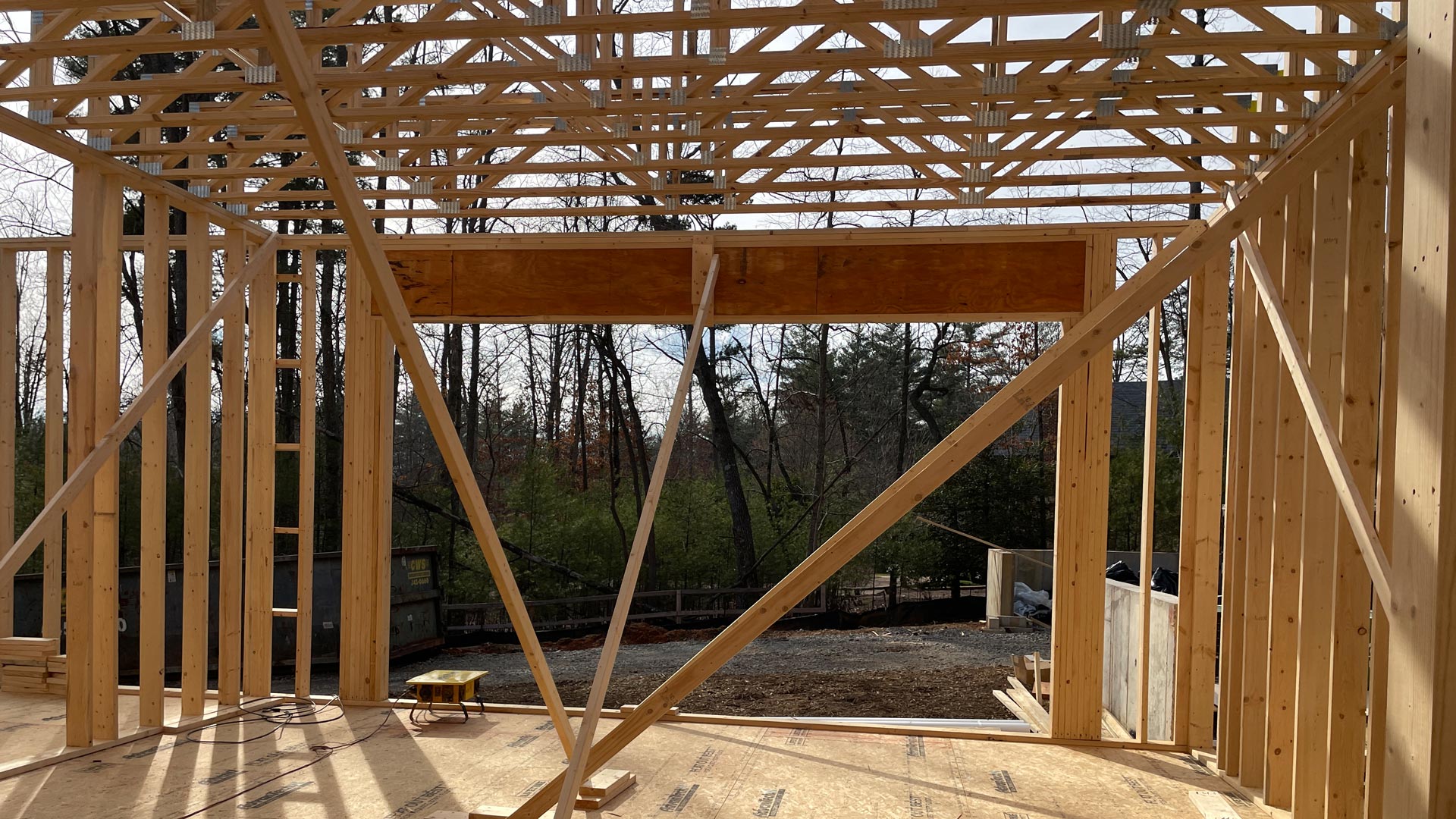 Large, framed opening for retractable, accordion doors to the outdoor living