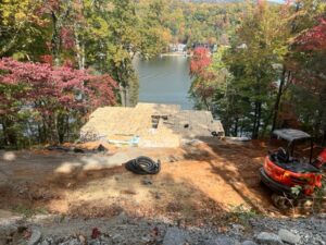 Building on steep slope on the shoreline of Lake Lure, ACM Design