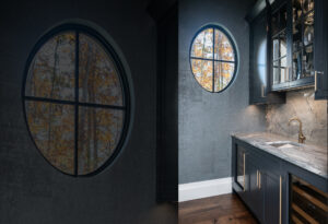 Wine bar tucked beside dining room and kitchen for easy entertaining in style