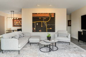 Create a private guest suite for extended stays with living room, bedroom, and kitchen. Private entrance from the main floor.