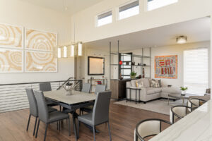 Reorienting the floor plan to create a cozy den at the front of the home where the dining room used to be