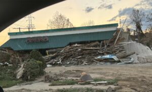 Biltmore Village large piles of washed up debris from the flood of the Broad River in Asheville, NC from Hurricane Helene, 2024